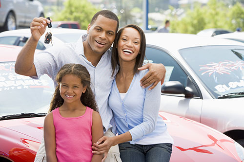 Family with keys to car